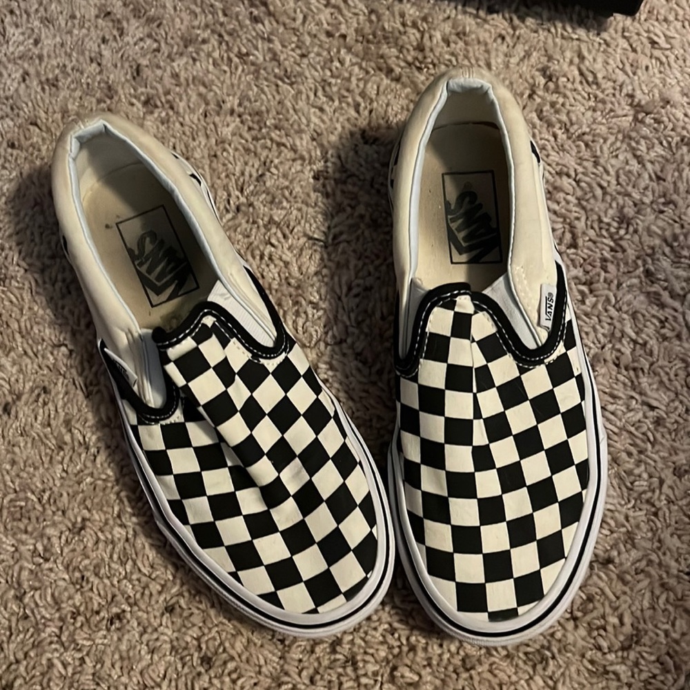 Black and white checkered vans. Clean and in good condition.